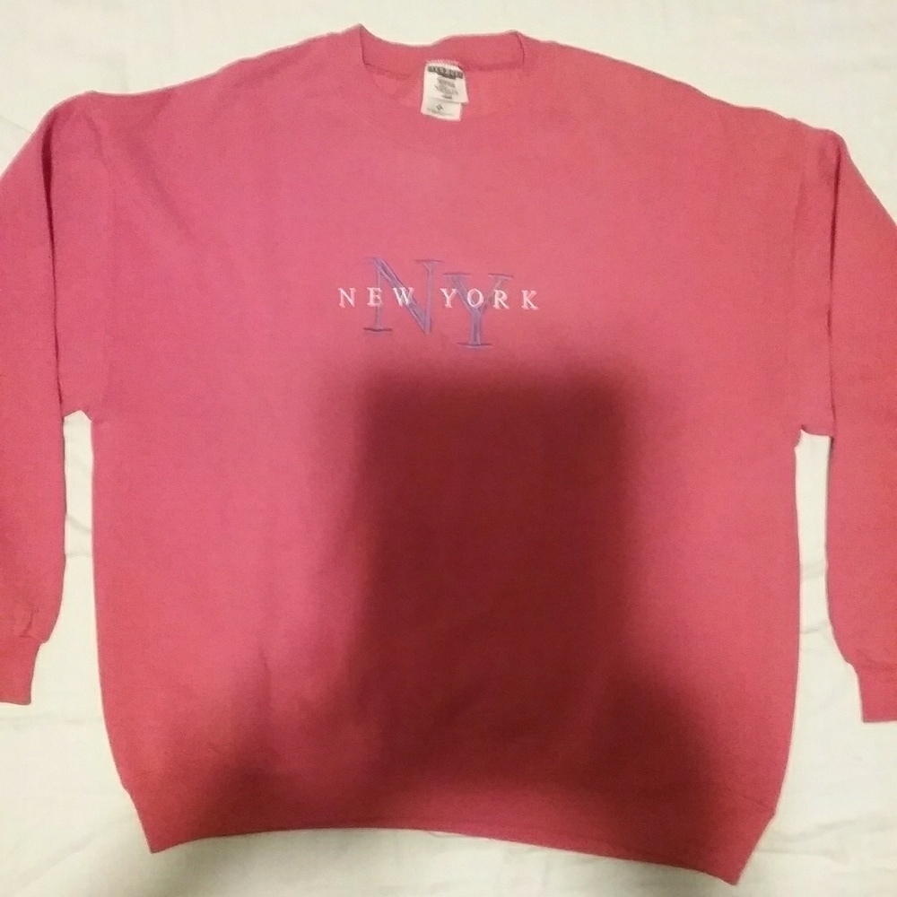 Women's peach color New York sweater